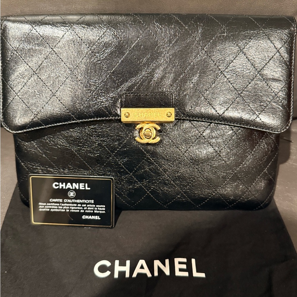 CHANEL LOGO Plate Black Quilted Distressed Turn Lock Pouch